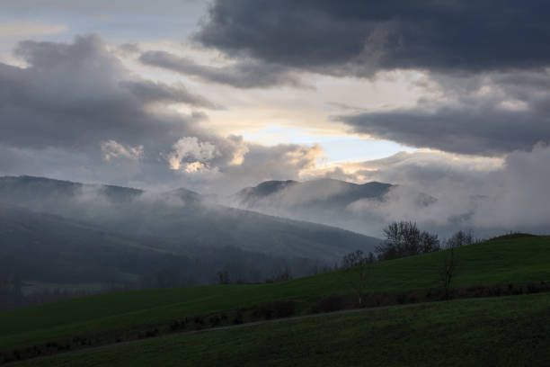 istock The Magic of Post-Storm: Celestial Colors and Misty Mountains 2075293403