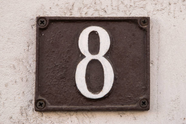 istock Old retro cast iron plate number 8 2075318474