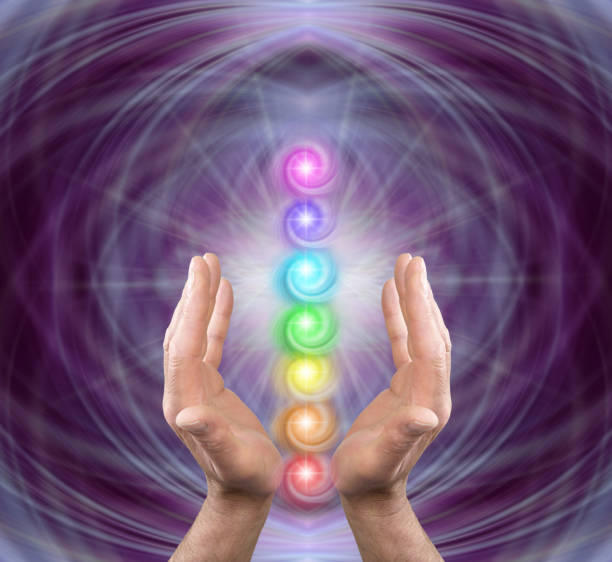 istock Reiki master offering the seven chakras 2075336806