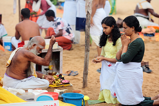 Varkala, Kerala, India - February 24, 2024: Religious ceremony Puja on the Papanasam beach