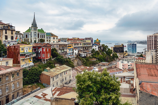 panoramic view on colorful historic cityscape of Valparaiso-Chile from the hills to the sea