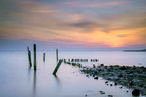 Sunset view over the mudflats of the waddenzee near former harbor of De Cocksdorp, Texel, The Netherlands, named Haventje van Sil (Sil's harbor)