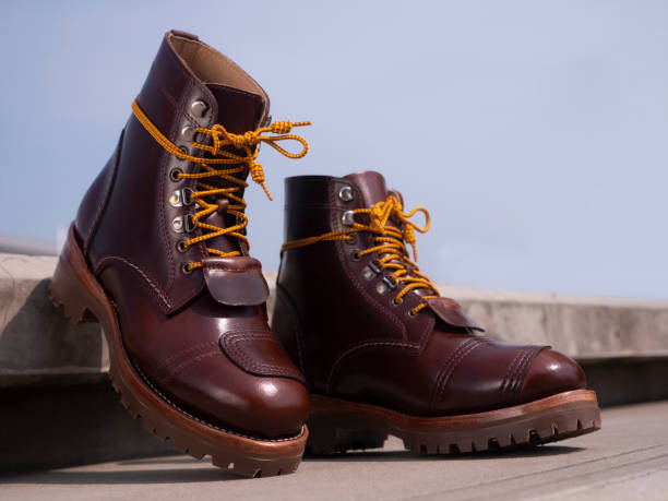 istock Man fashion brown boot leather on the ground. 2075378868