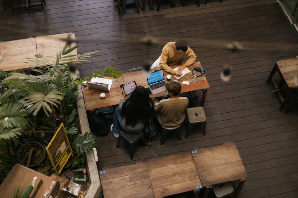 istock Above view of group of students learning at campus. 2075382145