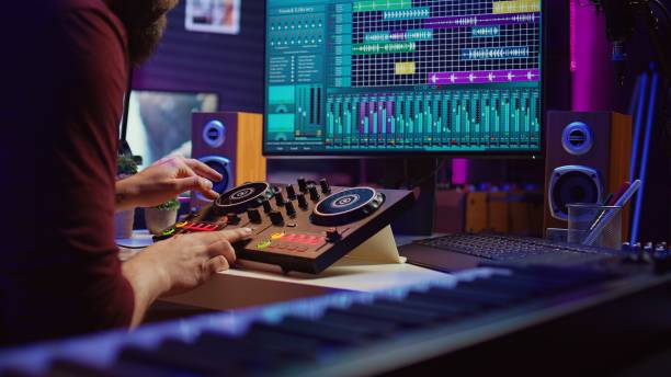 istock Audio engineer recording piano keyboard instrument notes and vocals 2075404754