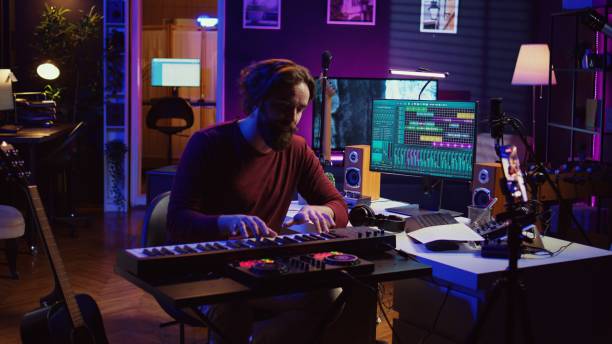 istock Artist teaching online piano lessons from his home studio 2075420846