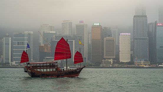 Victoria Harbour with low cloud.