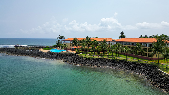 Sao Tome, Sao Tome and Principe – March 10, 2024: Aerial view of a beachfront hotel in Sao Tome