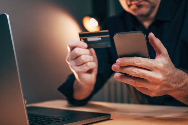 istock Electronic banking concept, e-banking with credit card, mobile phone and laptop computer 2075448617