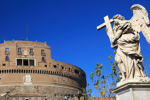 Castel Sant'Angelo - Mausoleum of Hadrian,  It was initially commissioned by the Roman Emperor Hadrian as a mausoleum for himself and his family. The Angel Carrying the Cross, is by Ercole Ferata erected approx 1669