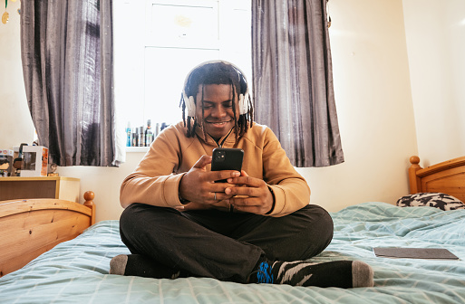 A day in a life of black teenager at home.