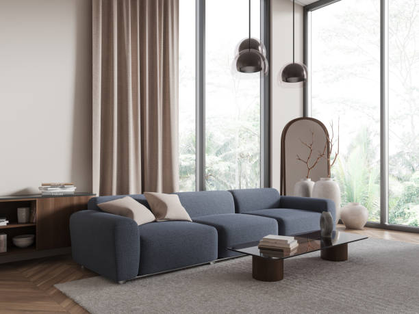 istock Cozy living room interior with couch and coffee table, drawer and window 2075496576