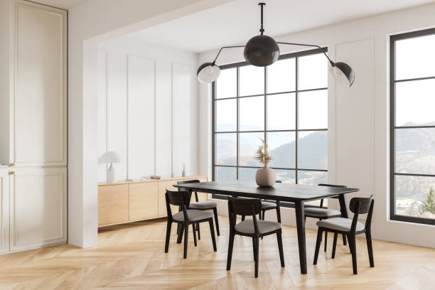istock Light living room interior with eating table and chairs, panoramic window 2075509097