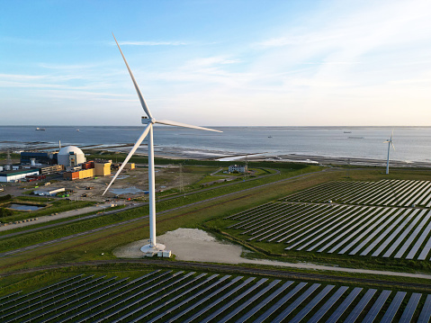 Wind turbines stand off the shores of Block Island, Rhode Island, USA.