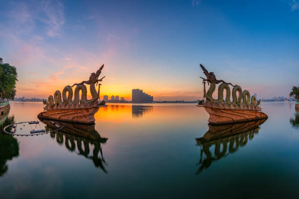 West Lake Dragons statue in Hanoi in early morning West Lake Dragons statue in Hanoi. The dragons which set the Vietnam Guinness record as the countrys biggest at the 1,000th anniversary of Thang Long-Hanoi west lake stock pictures, royalty-free photos & images