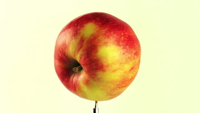 Fresh red apple rotating and spinning
