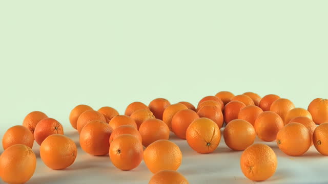 Heap of orange fruits cut out