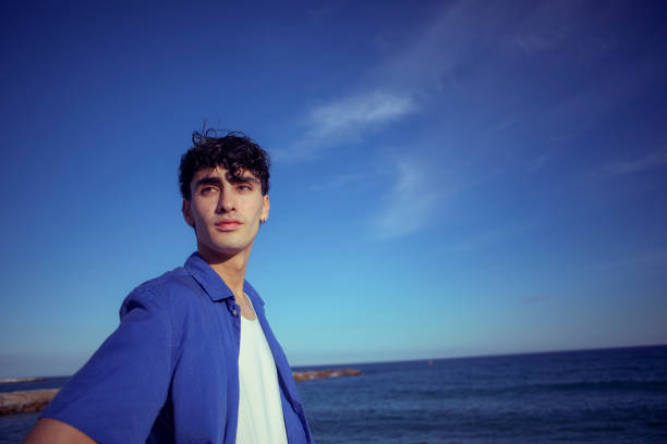 Portrait of young man on the beach