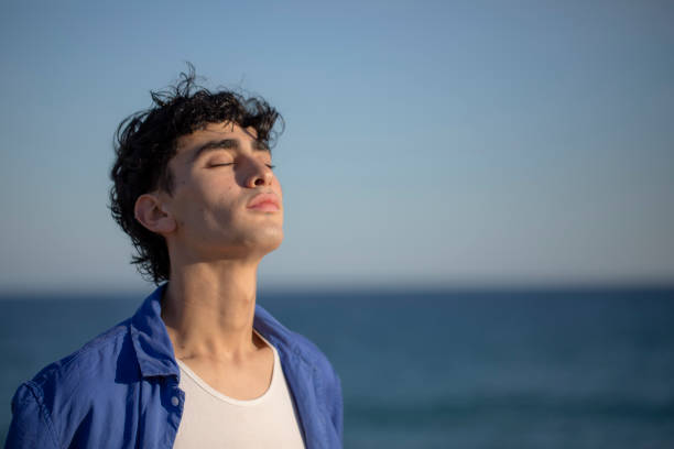 Portrait of young man on the beach