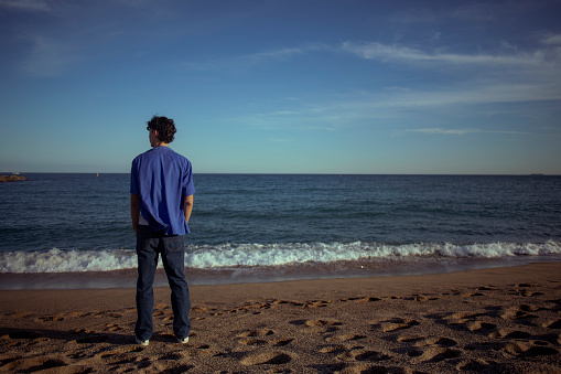 Portrait of young man on the beach