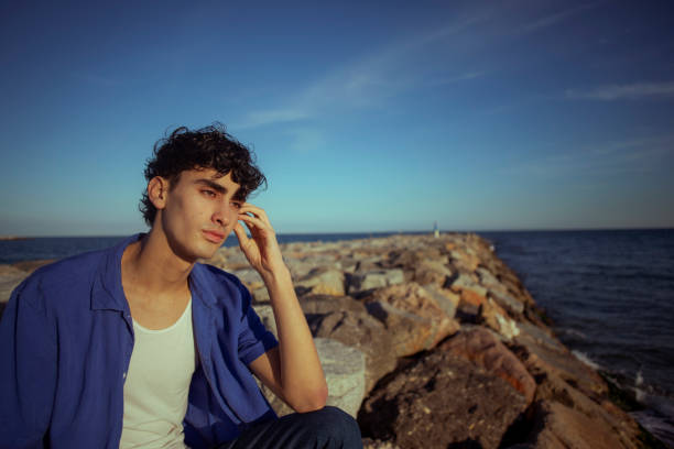 Portrait of young man on the beach