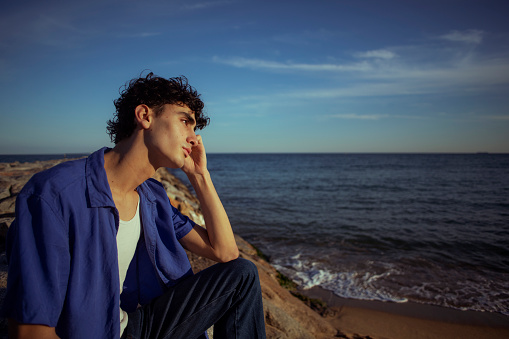 Portrait of young man on the beach