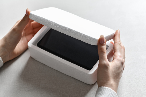 Well Placed And Packed Smartphone In Protective Styrofoam Box