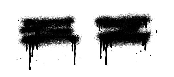 Black color spray paint or graffiti design element on the white wall background.