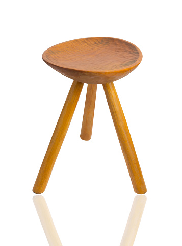 round top maka wood stool isolated on white background