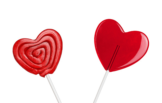 red heart-lollipops isolated on white background