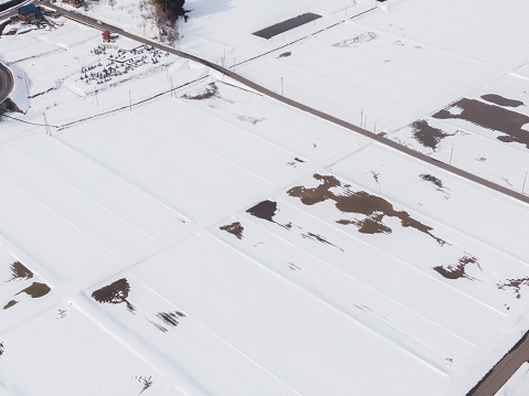 Drone photography: Rice fields where the snow is melting