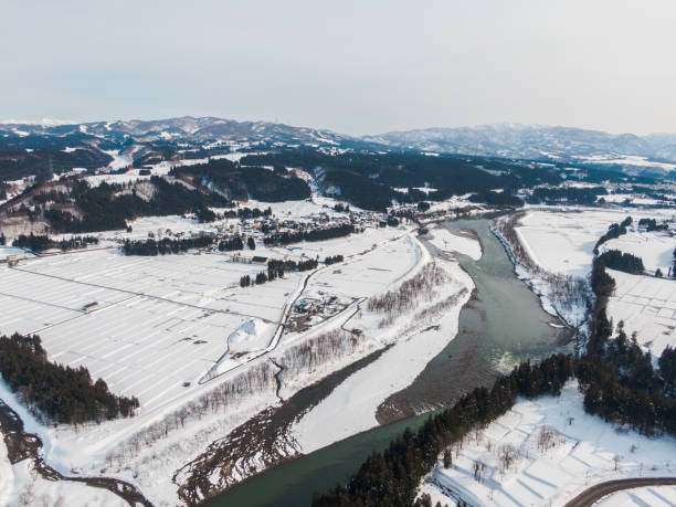istock Drone photography: vast rural natural landscape covered in snow 2075655308