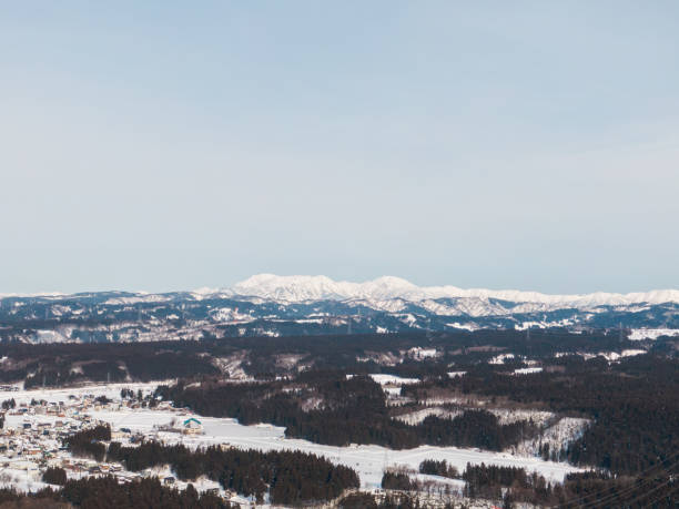 istock Drone photography: vast rural natural landscape covered in snow 2075658036