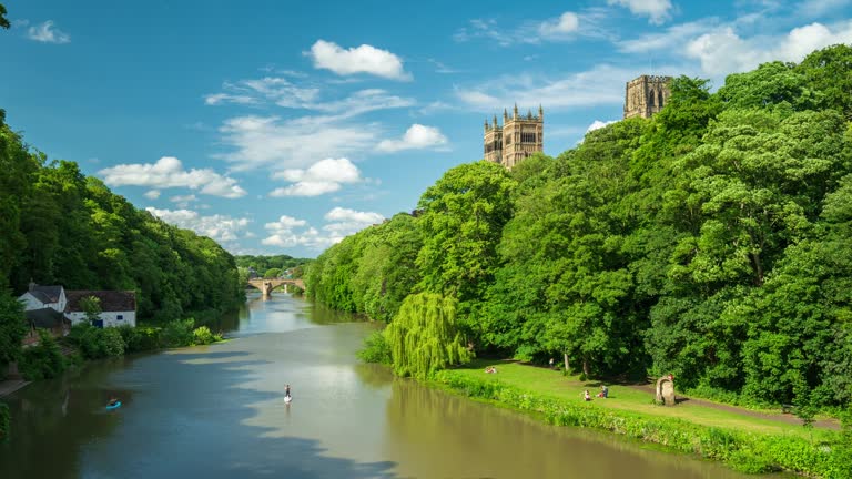 Tranquil scene of River Wear and Durham Cathedral with in North East England, UK - 4k time lapse (Zoom out)