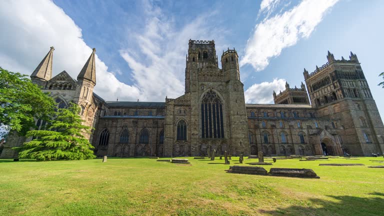 Durham Cathedral with clouds and blue sky in North East England, UK - 4k time lapse