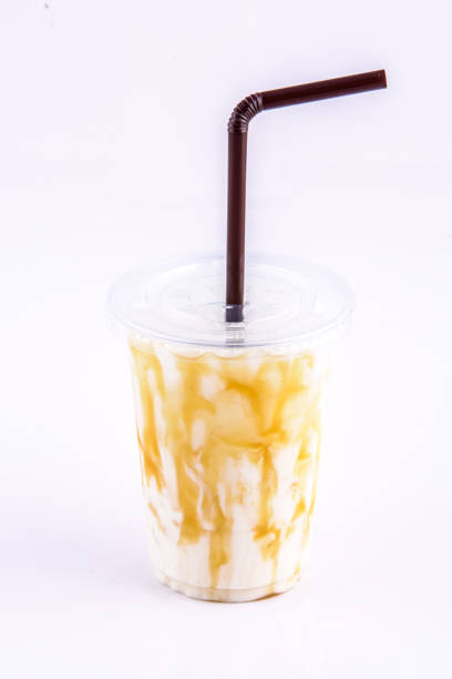 istock Iced Caramel Milk. Beverage for summer with brick wall background. 2075684060