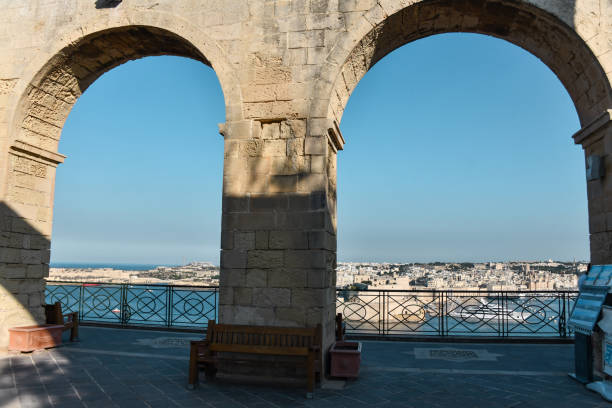 The View Of Malta From Upper Barrakka Garden Pillars In Valetta, Malta The View Of Malta From Upper Barrakka Garden Pillars In Valetta, Malta st julians bay stock pictures, royalty-free photos & images