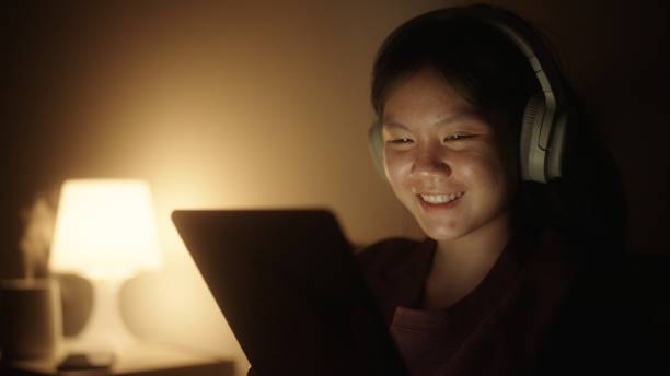 istock Teenager enjoy entertainment with digital tablet. 2075700466