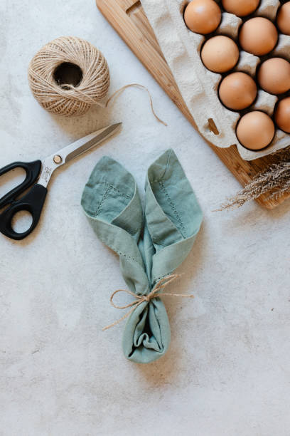 istock Easter napkin fold with bunny ears 2075741770