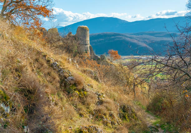 The suggestive mountain natural park in Abruzzo region with snow during the winter. Here in particular the Monte Cava (2000 meters) with grey clouds.