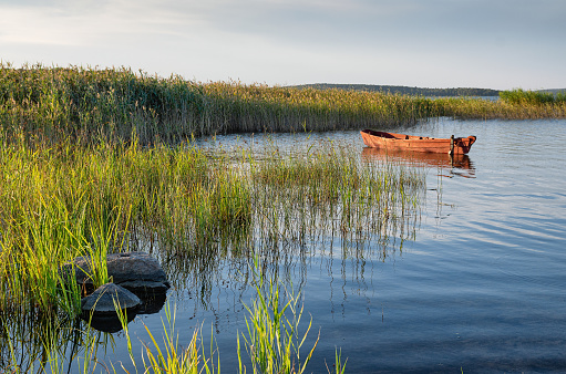 The Middle Urals, a fishing boat on Lake Chebarkul.