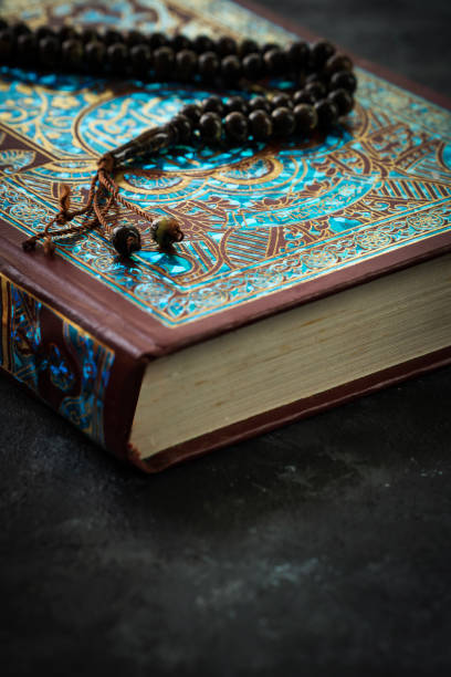 istock Close up image of Quran with prayer bead 2075765324