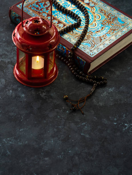 istock Ramadan lantern lamp with Quran 2075765325