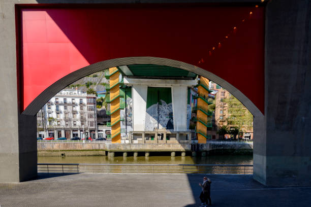 Bilbao, Spain: 03 12 2019 :  Graffitti in the bridge. Bilbao cityscape a sunny day .