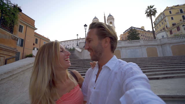 Selfie portrait of young couple in Rome at the Piazza di Spagna, Italy