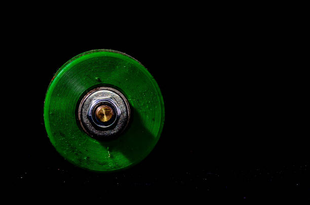 Old Vintage Consumed Skate Wheel on a Black Background