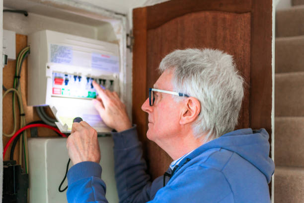 istock Senior man checking electric fuses at home 2075842350