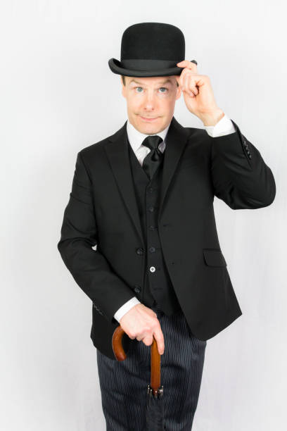 istock Polite British Gentleman Doffing Bowler Hat 2075867844
