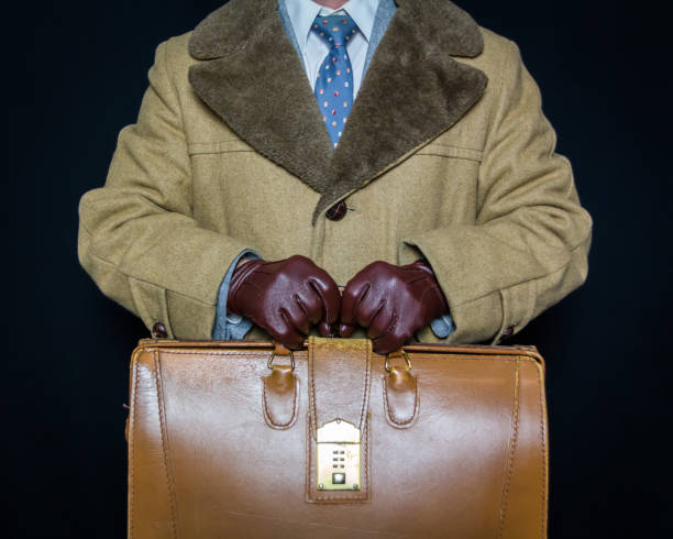 istock Secret Agent Spy Holding Briefcase 2075868912