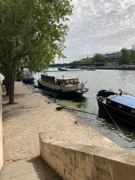istock River Seine in Paris with boats docked 2075877024